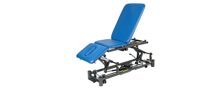 Cardon Physical Therapy Treatment Table blue with black frame back tilted up foot section tilted down