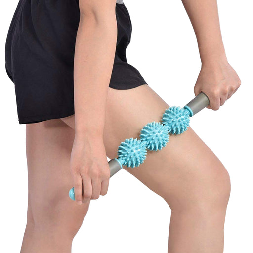 Tril Roller Massage Stick being demonstrated on leg by female model