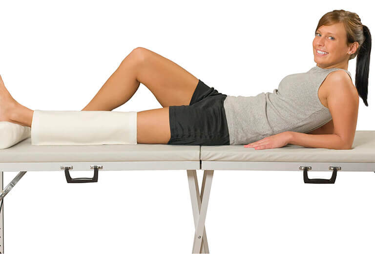 Heating pad used to relieve leg pain on client