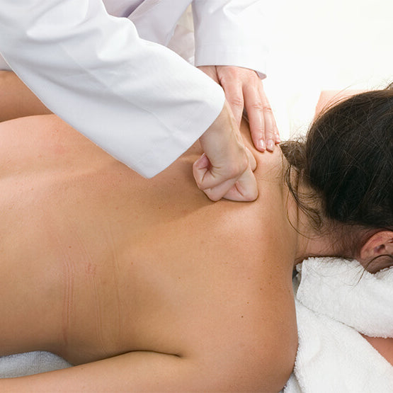 Female Massage patient receiving Petrissage