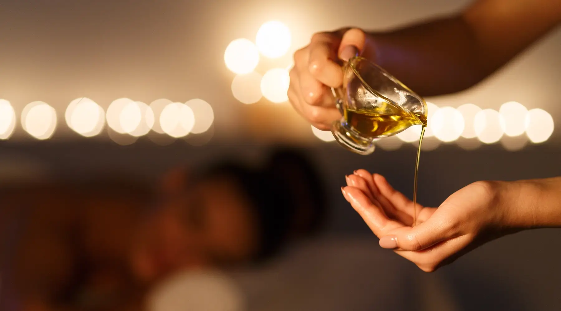 Professional massage oil used during treatment, highlighting product performance and cost considerations for massage clinics