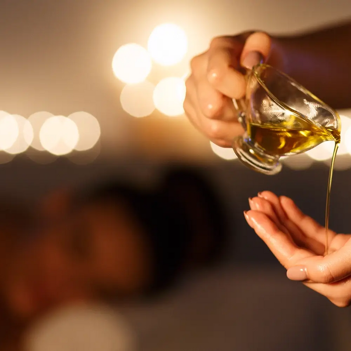 Professional massage oil used during treatment, highlighting product performance and cost considerations for massage clinics