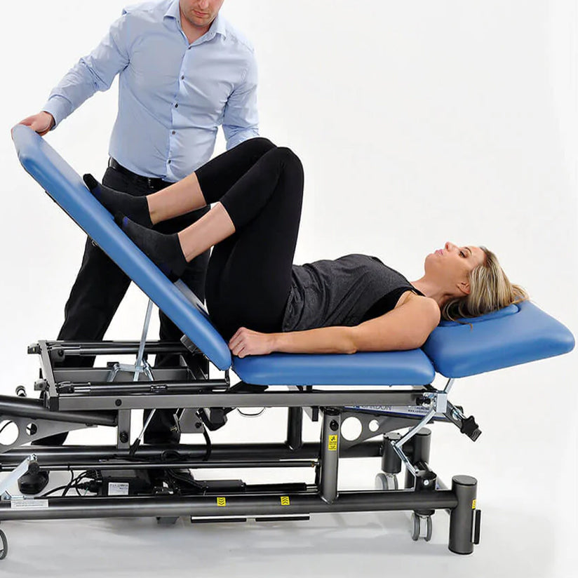 Physiotherapist examining a patient