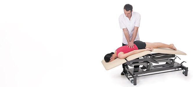 BodyBest Physiotherapy treatment table with female / male demonstrating on female face down