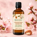 Lifestyle image of BodyBest Almond Sweet carrier oil 100ml with almond nuts and almond blossom 