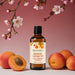 Lifestyle image of BodyBest Apricot Carrier Oil with apricots and apricot blossom