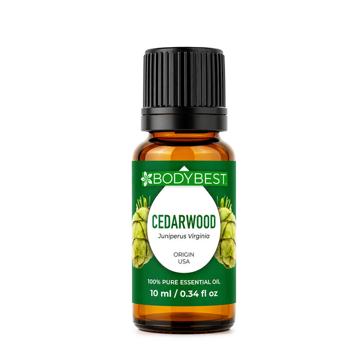 Body Best Cedarwood Essential Oil, 10 ml amber glass bottle with brown cap and green cedarwood label displayed on a white background.