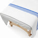 Body Best Flannel Hospital Blanket Draped Over Massage Table in Professional Spa Setting