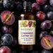 Lifestyle image of BodyBest Grapeseed carrier oil 100ml with purple grapes