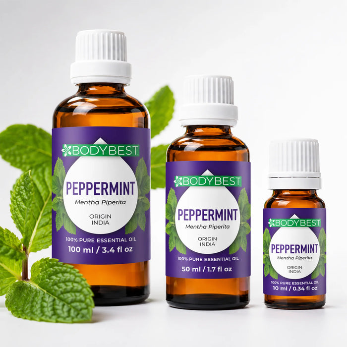 BodyBest Peppermint essential oil 100ml, 50ml and 10ml hero image amber glass bottle on white background with peppermint leaves