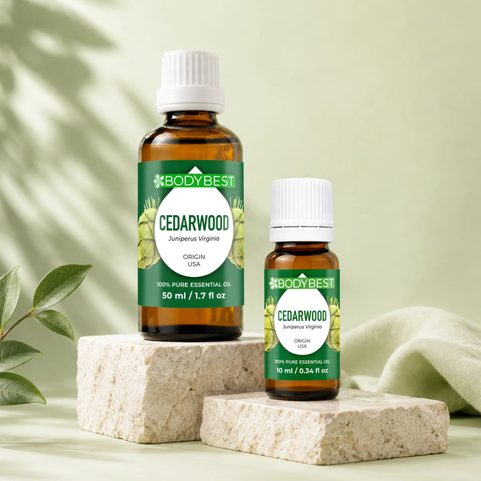BodyBest Cedarwood essential oil lifestyle image on studio settings 50ml and 10ml