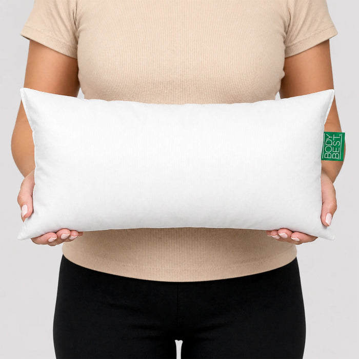 BodyBest 7x15 inch vinyl covered massage pillow support cushion held by a model