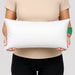 BodyBest 7x15 inch vinyl covered massage pillow support cushion held by a model