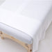 White Cotton Thermal blanket on table folded over