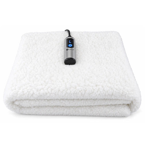 Earthlite Professional Table Warmer folded with plush white fleece fabric and digital temperature controller on a white background.