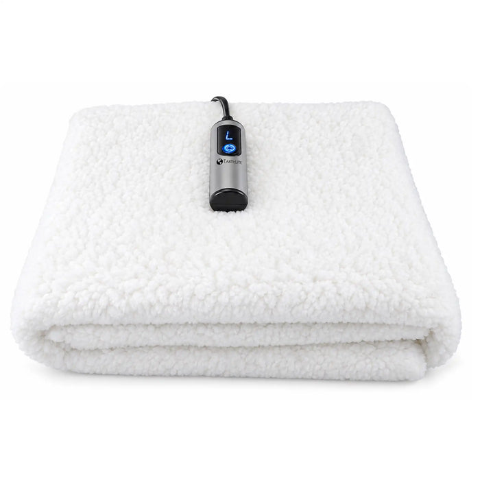 Earthlite Professional Table Warmer folded with plush white fleece fabric and digital temperature controller on a white background.