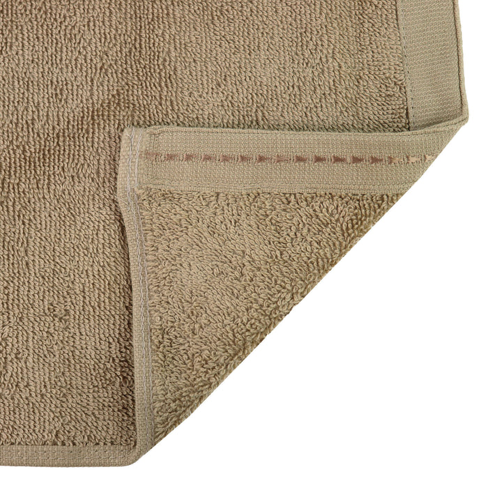 Organic face towel 13" x 13" Sand folded corner showing stitched hem