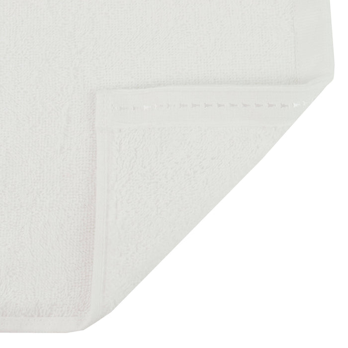 Organic face towel 13" x 13" White folded corner showing stitched hem