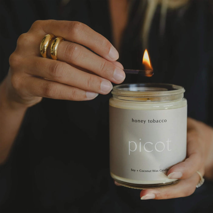 Lighting a Honey Tobacco Candle from Picot Collective 