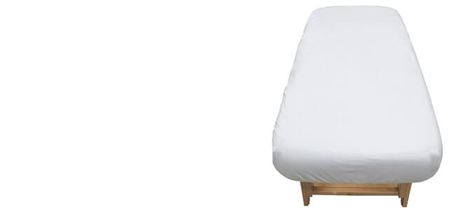 Table cover on stationary treatment table