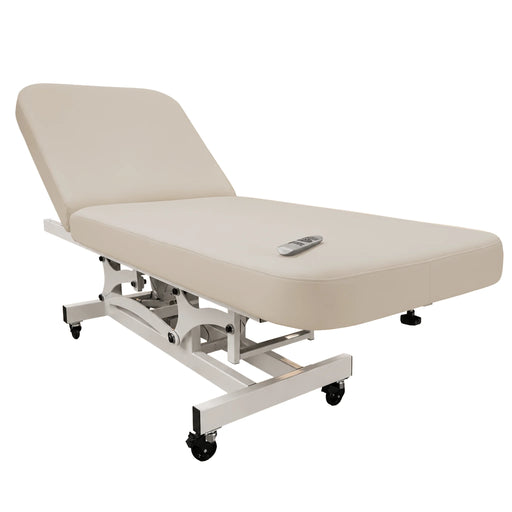 silhouet-Tone sand-colored electric spa treatment table (sandy beach) shown in use in a professional spa setting