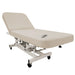 silhouet-Tone sand-colored electric spa treatment table (sandy beach) shown in use in a professional spa setting