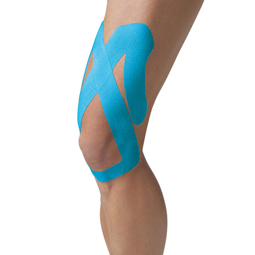 Upper knee spider tech pre cut tape on male models knee and thigh