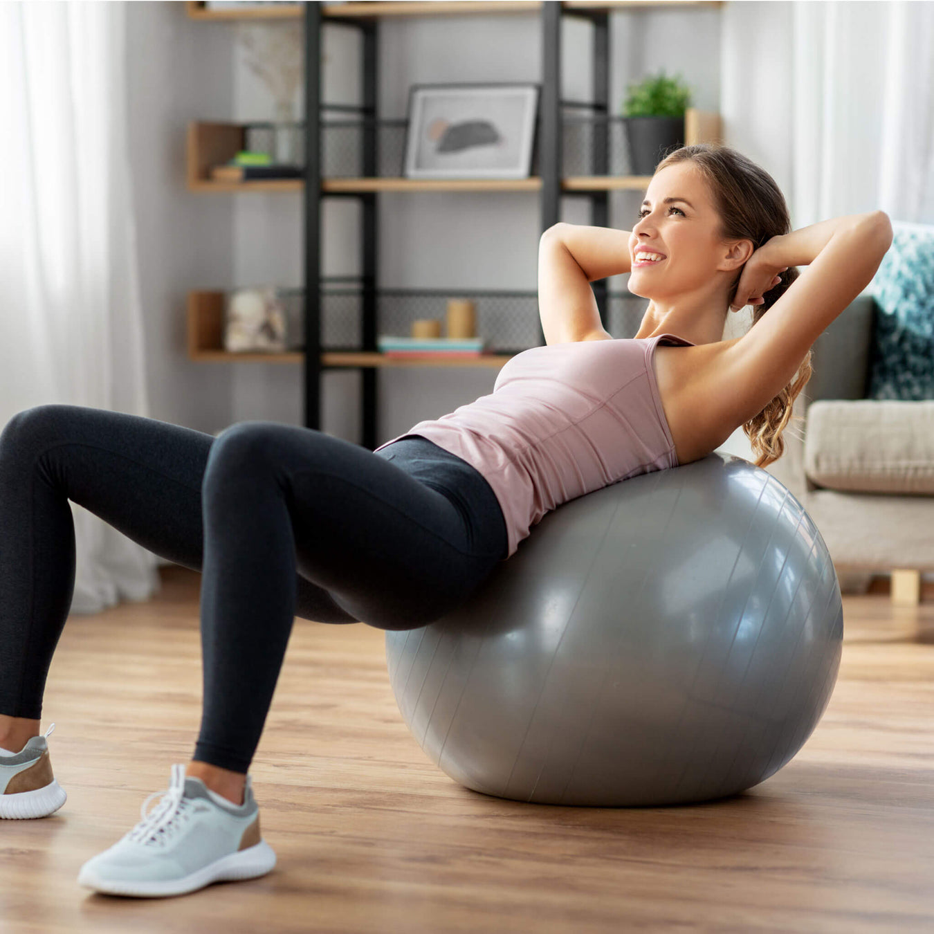 TheraBand Pro Series Exercise Ball in use by female model