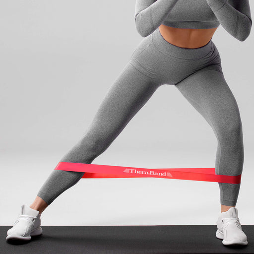 TheraBand Resistance Loop Band in use stretching
