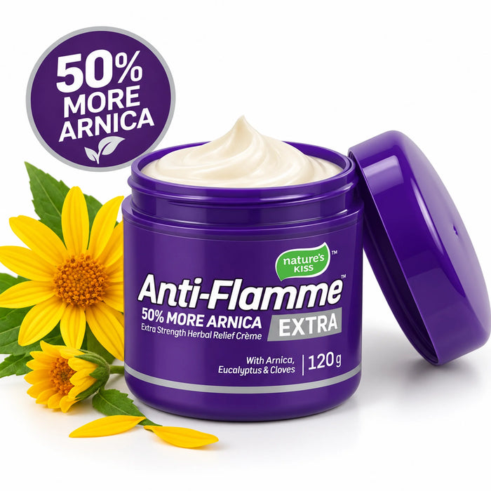 A purple jar of Nature's Kiss Anti-Flamme Extra herbal relief cream with a white cream swirl inside, shown with its lid leaning against it. Yellow flowers and green leaves decorate the base, and a circular badge in the top left reads '50% MORE ARNICA'.