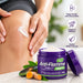 A person applies Nature's Kiss Anti-Flamme Mobility Joints herbal relief cream 90g to a knee. The scene includes product benefits icons on the right and turmeric root and green leaves on a marble surface.