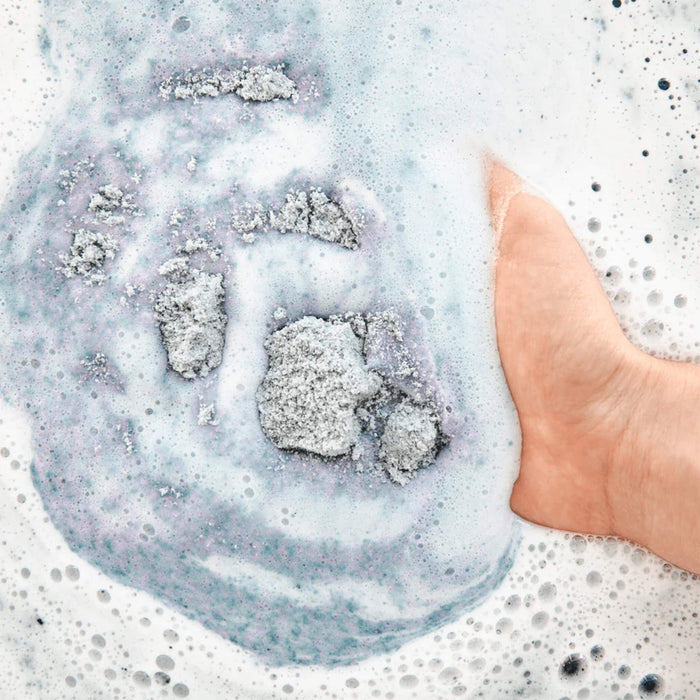 Bathorium Crush Bath Soak Midnight Superbloom foaming in bath water