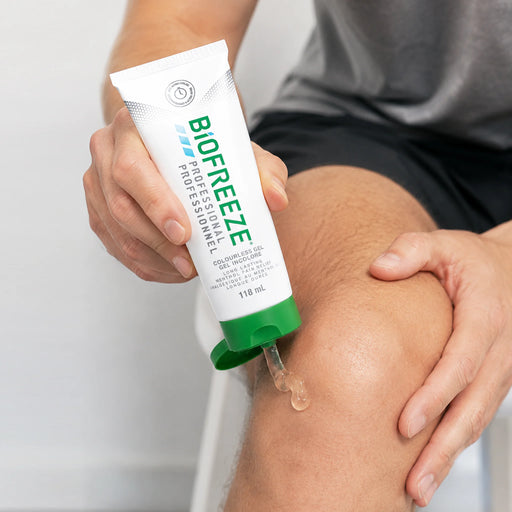 Biofreeze Professional Cooling Gel being applied to knee pain for targeted relief
