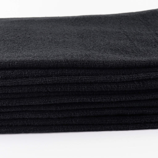 Bodybest black bleach resist face towel on a white background