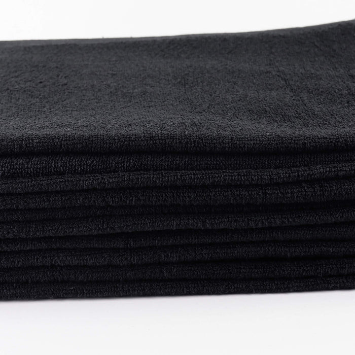 Bodybest black bleach resist face towel on a white background