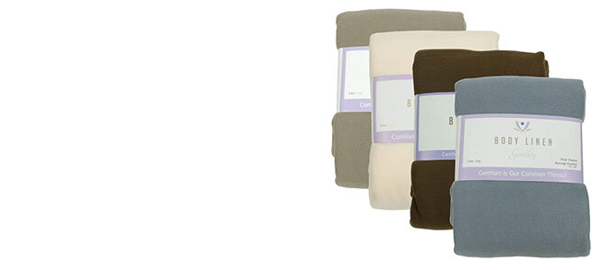 4 available colours in Body Linen blanket grey chocolate natural sage