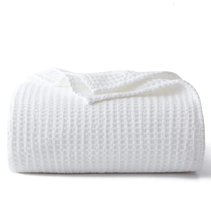 White waffle weave blanket on a white background