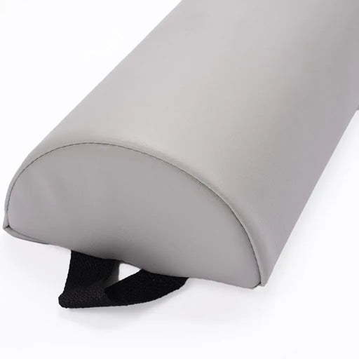 Grey half moon bolster from BodyBest against a white background