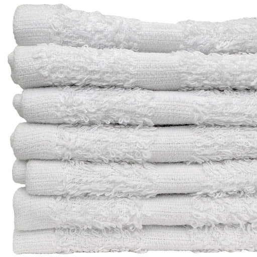 Stack of white face towels on a white background