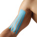 Body BestvSpiderTech Fan Pre cut Tape colour blue on male models upper arm