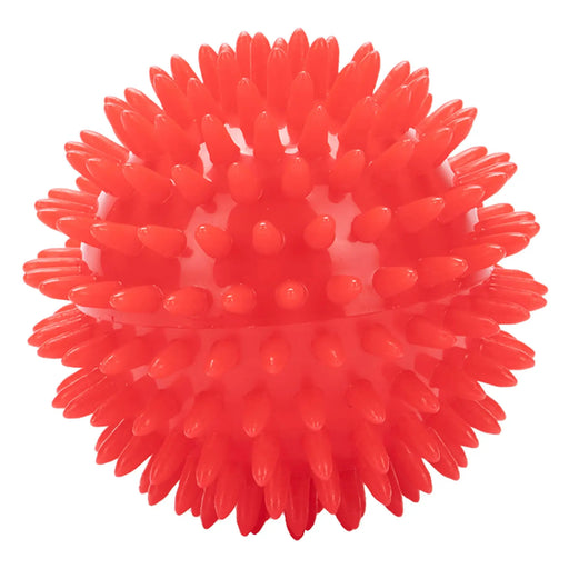 Red spiky massage ball on a white background