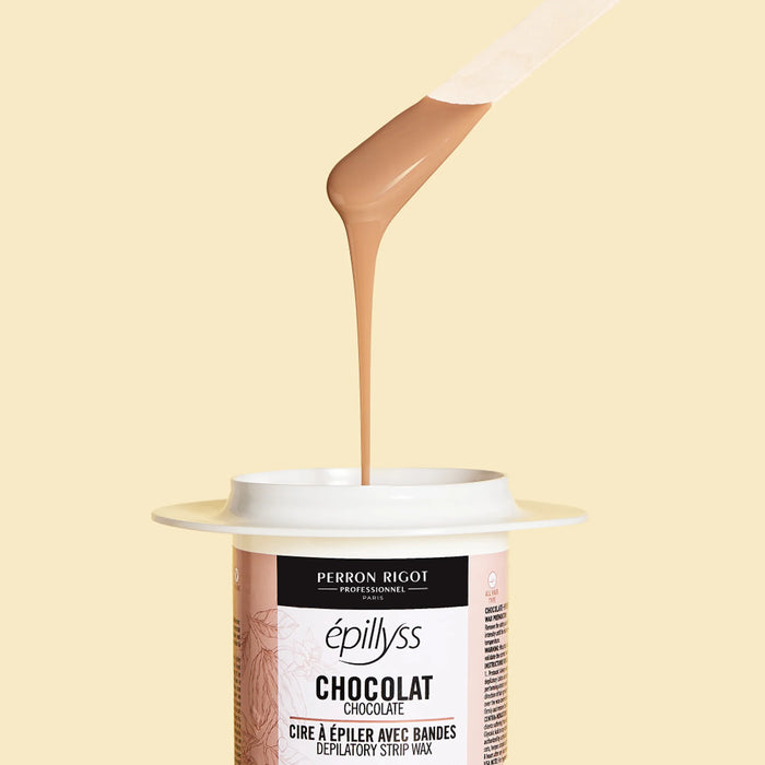 Epillyss chocolate lukewarm depilatory soft wax is in use with wooden spatula, wax consistency and wax color is being shown