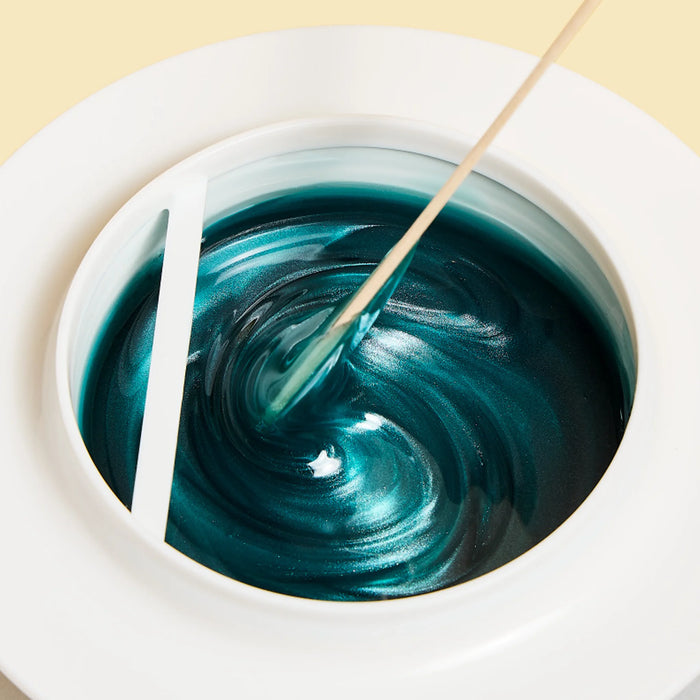 Wax consistency and wax color of Epillyss senior depilatory soft wax with wooden spatula