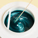Wax consistency and wax color of Epillyss senior depilatory soft wax with wooden spatula
