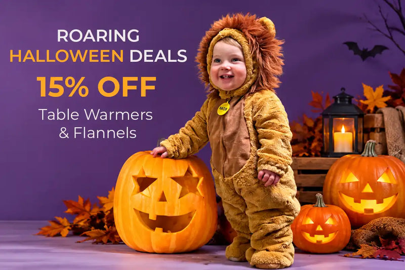 BodyBest Halloween sale banner for mobile featuring a child in a lion costume with glowing pumpkins, promoting 15% off massage table warmers and flannel 