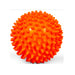 Orange spiky ball on a white background