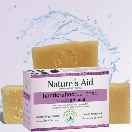 Nature's Aid handcrafted bar soap shown with its retail box and two bars of soap, set against a white background with a water splash graphic.