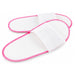 a pair of Non woven disposable open toe slippers in white color with pink stitches