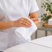 Standard face towels in white color 13 inch by 13 inch is in use in spa settings
