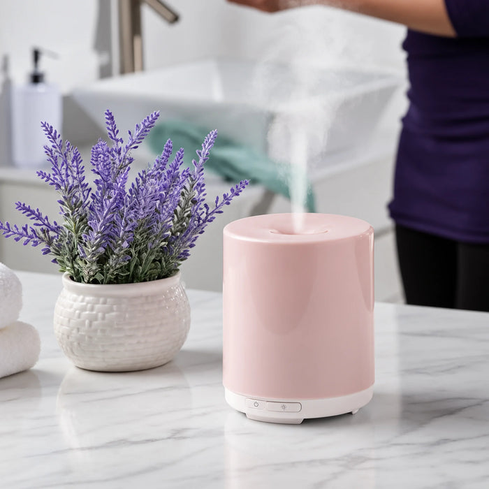 Voyage Ultrasonic Aroma Diffuser in use on a professional spa treatment room counter